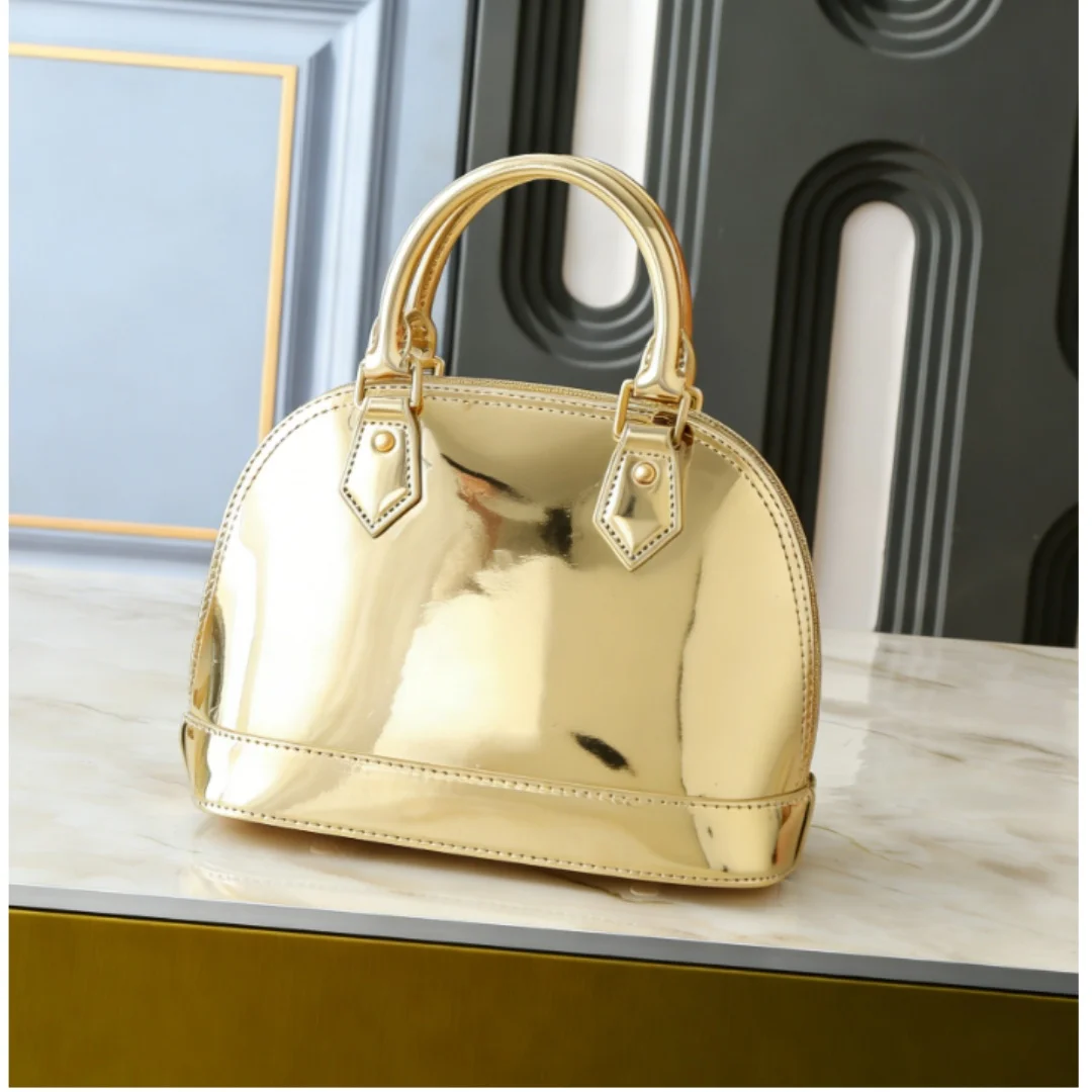 

New Size 23.5CM Fashion Versatile Letter Print Hand-held Cross-body Shell-shaped Bag No Box