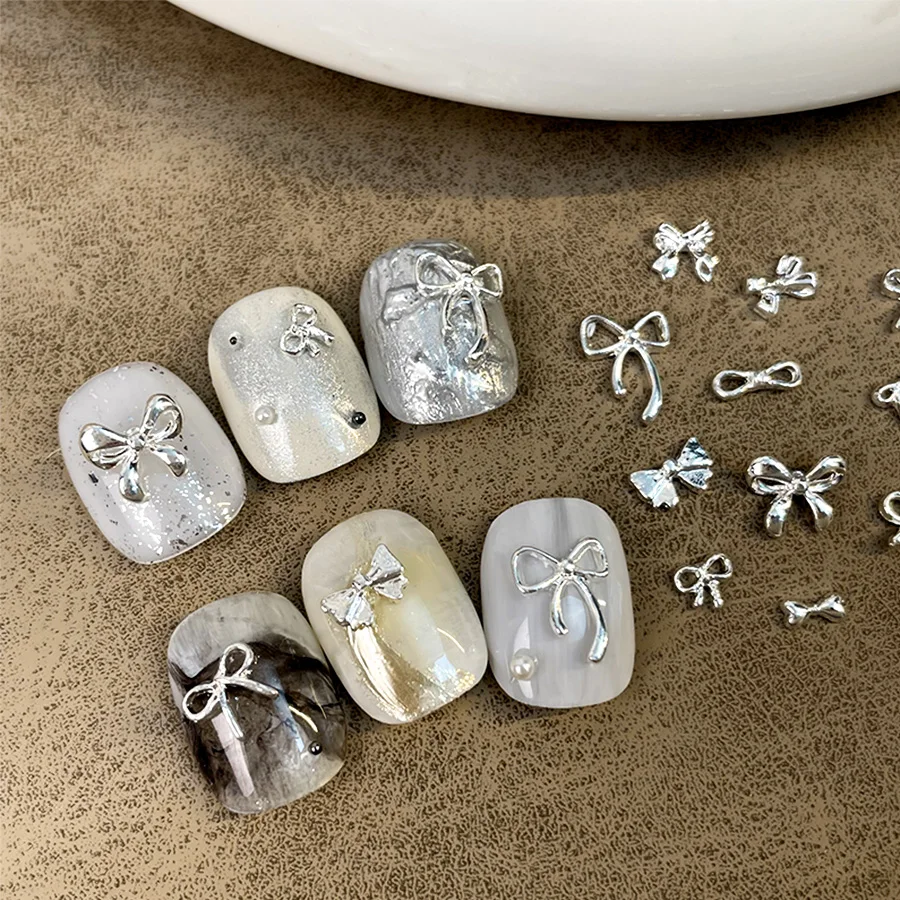 10 sztuk/worek luksusowa kokardka Nail Art Charms 3D stop muszka biżuteria do paznokci dekoracja ze strasem DIY akcesoria