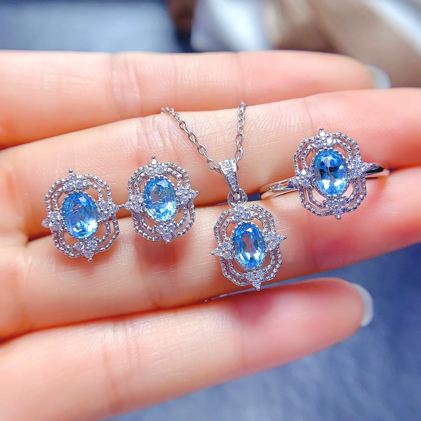 

KJJEAXCMY Girls' Jewelry 4x6mm Natural Blue Carved Topaz Necklace Pendant Ring Earnail Set 925 Pure Silver Plated 18K White Gold