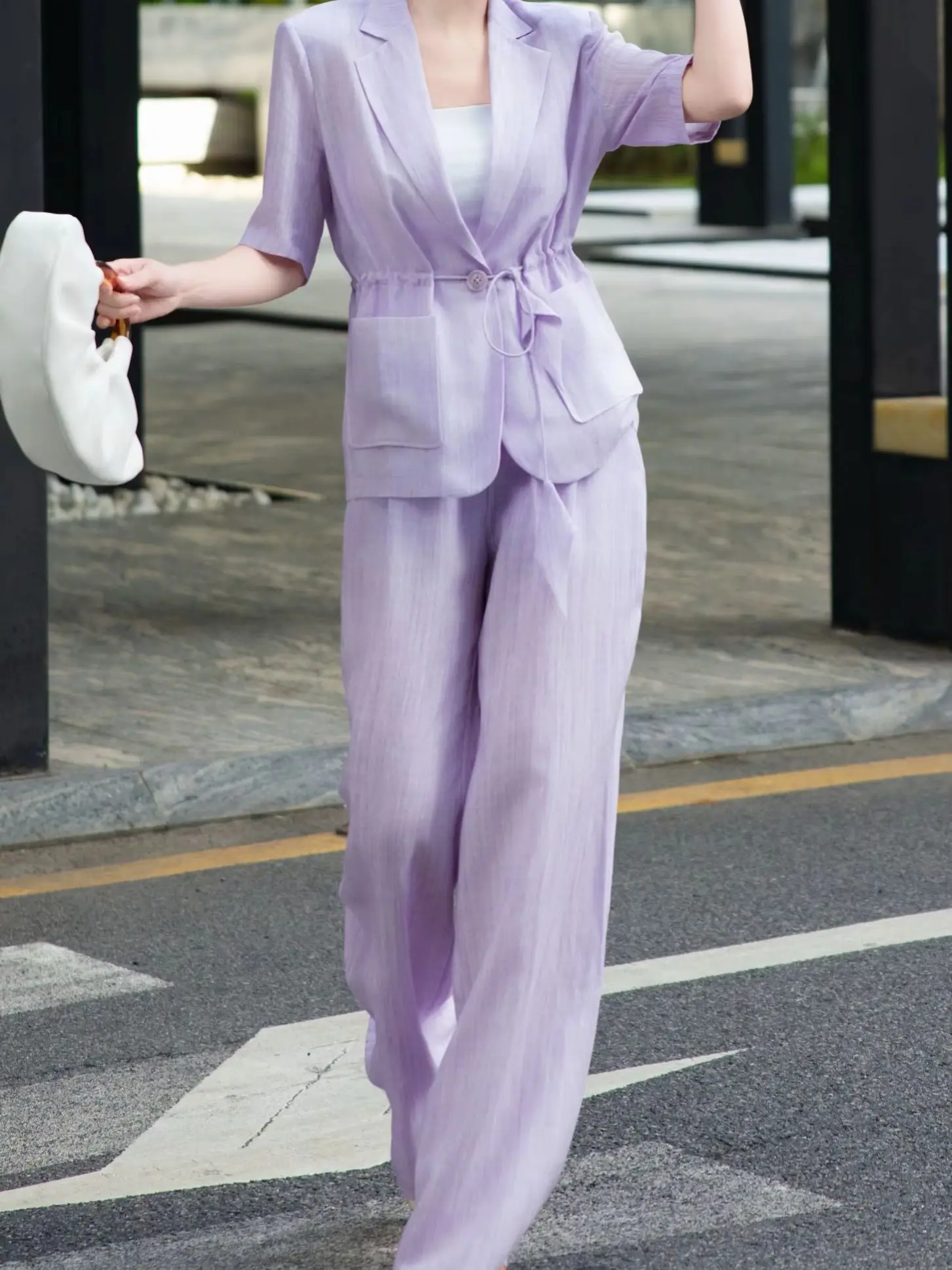 

Elegant office summer linen trouser suit with short sleeved blazer