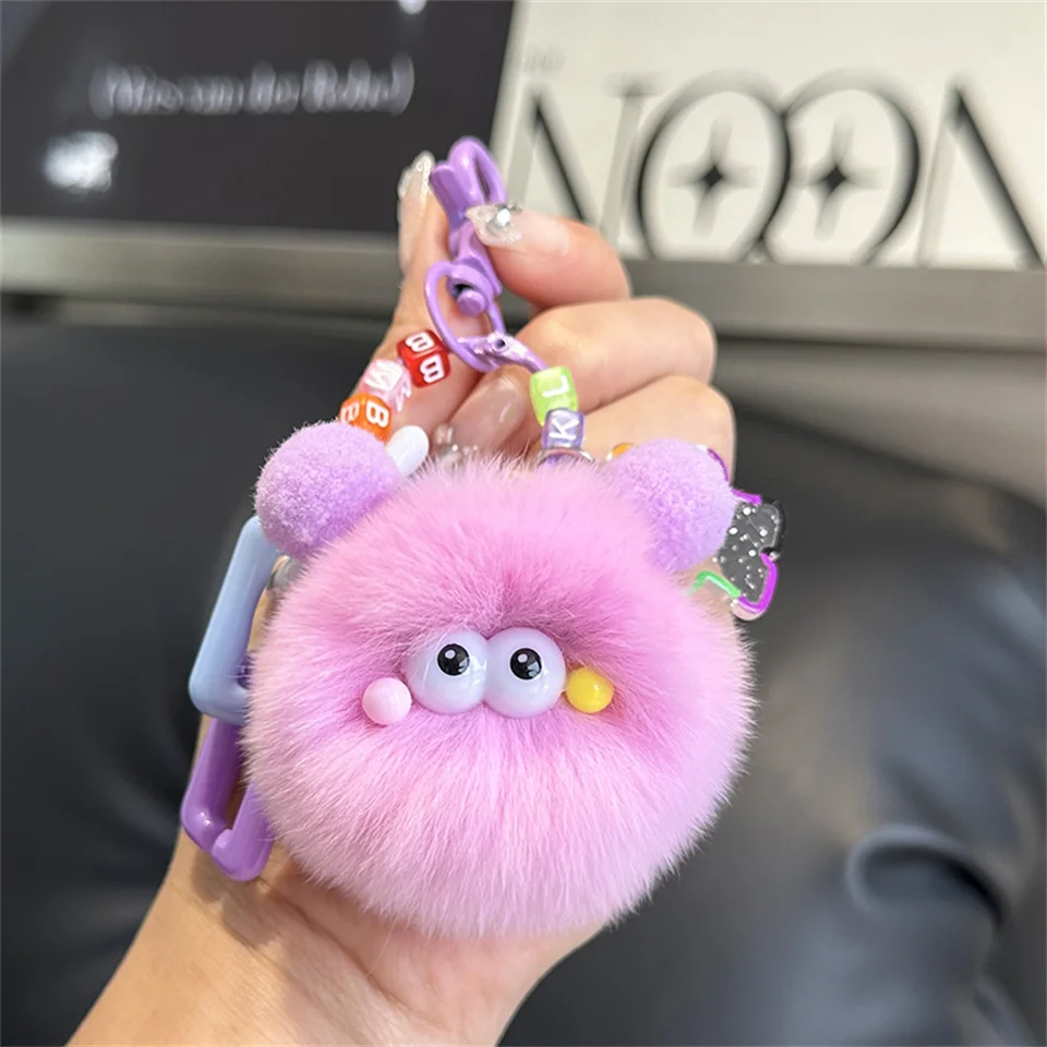 LLavero de dibujos animados para coche, muñeco de peluche con bola de carbón pequeña, colgante para mochila, regalo de joyería