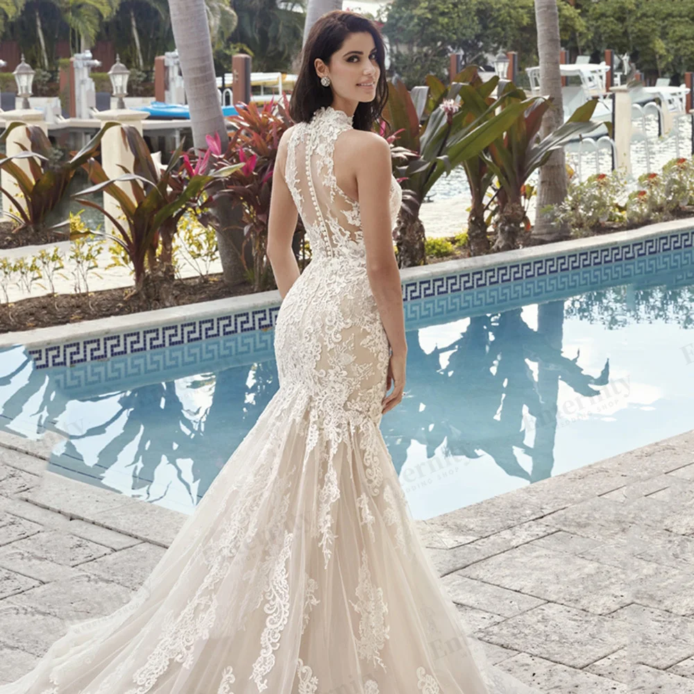 Extravagant Lace Appliques Mermaid Wedding Dress Sleeveless Illusion Back With Buttons Sweep Train Sweetheart Robe De Mariée