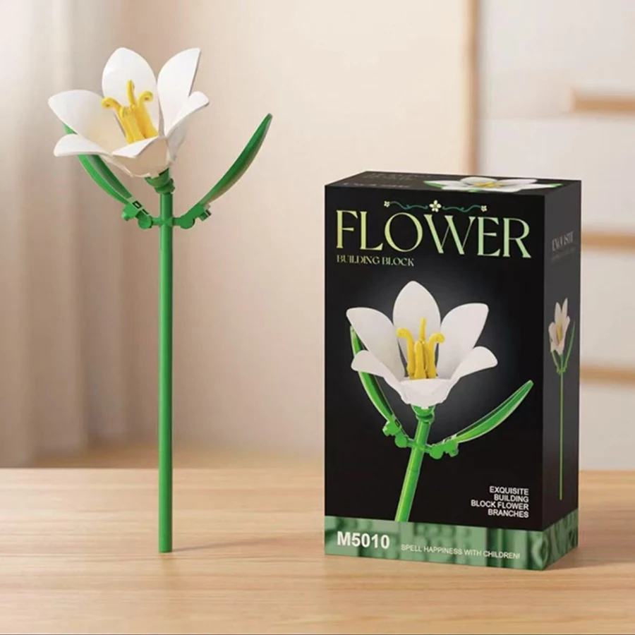 أربعة حلي منضدية على شكل زهرة مكعبات بناء. زنبق، وردة، جاردينيا، مكعبات بناء عشبة المحور. هدايا عيد الميلاد، هدايا المهرجانات.