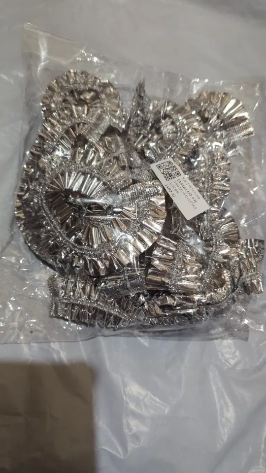 Reusable elastic aluminum foil food cover used on a kitchen bowl