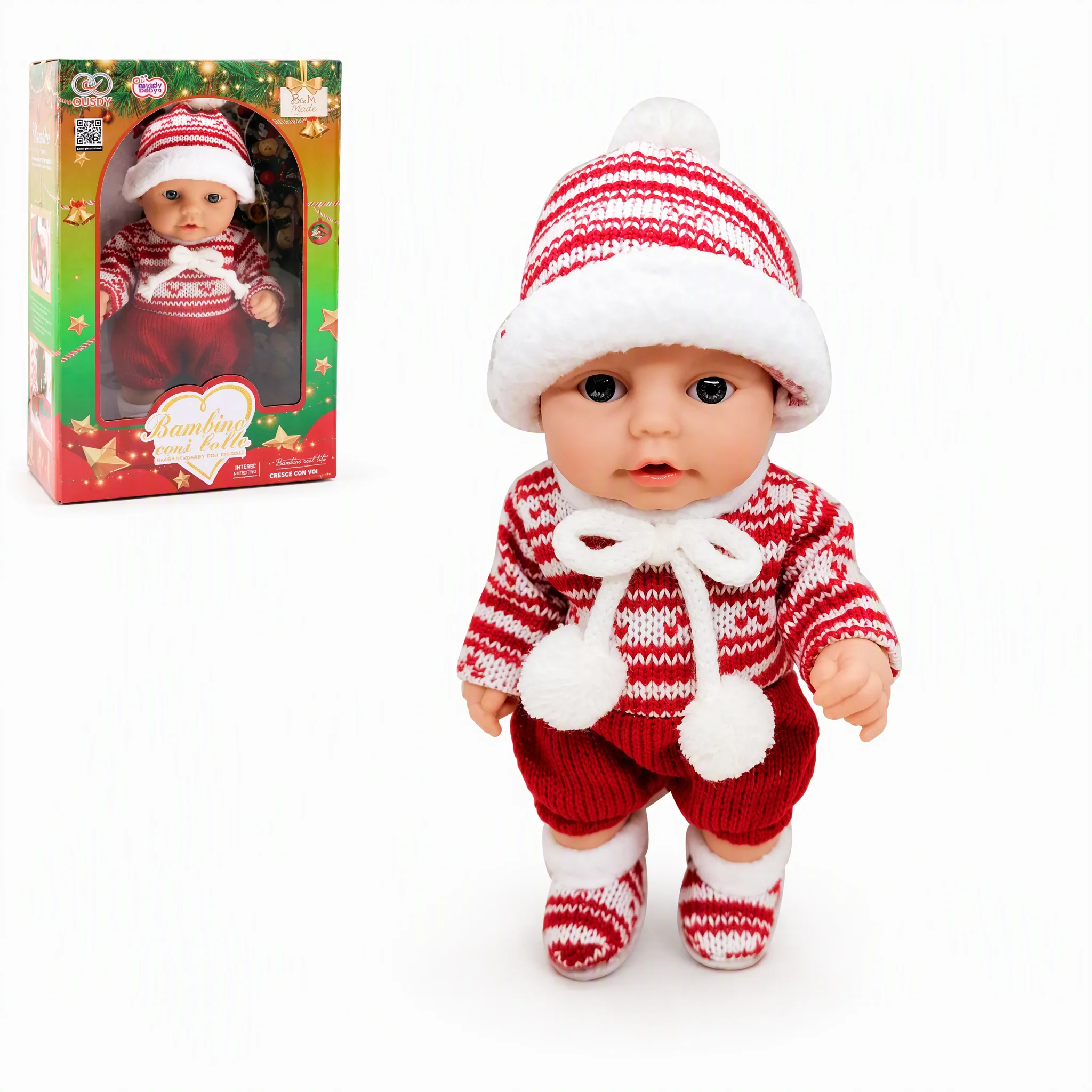 25 cm grote babypop met een gebreide kerstoutfit, muts, sjaal en bijpassende accessoires. Verkrijgbaar in twee verschillende modellen, waaruit u kunt kiezen. Ideaal om cadeau te geven.