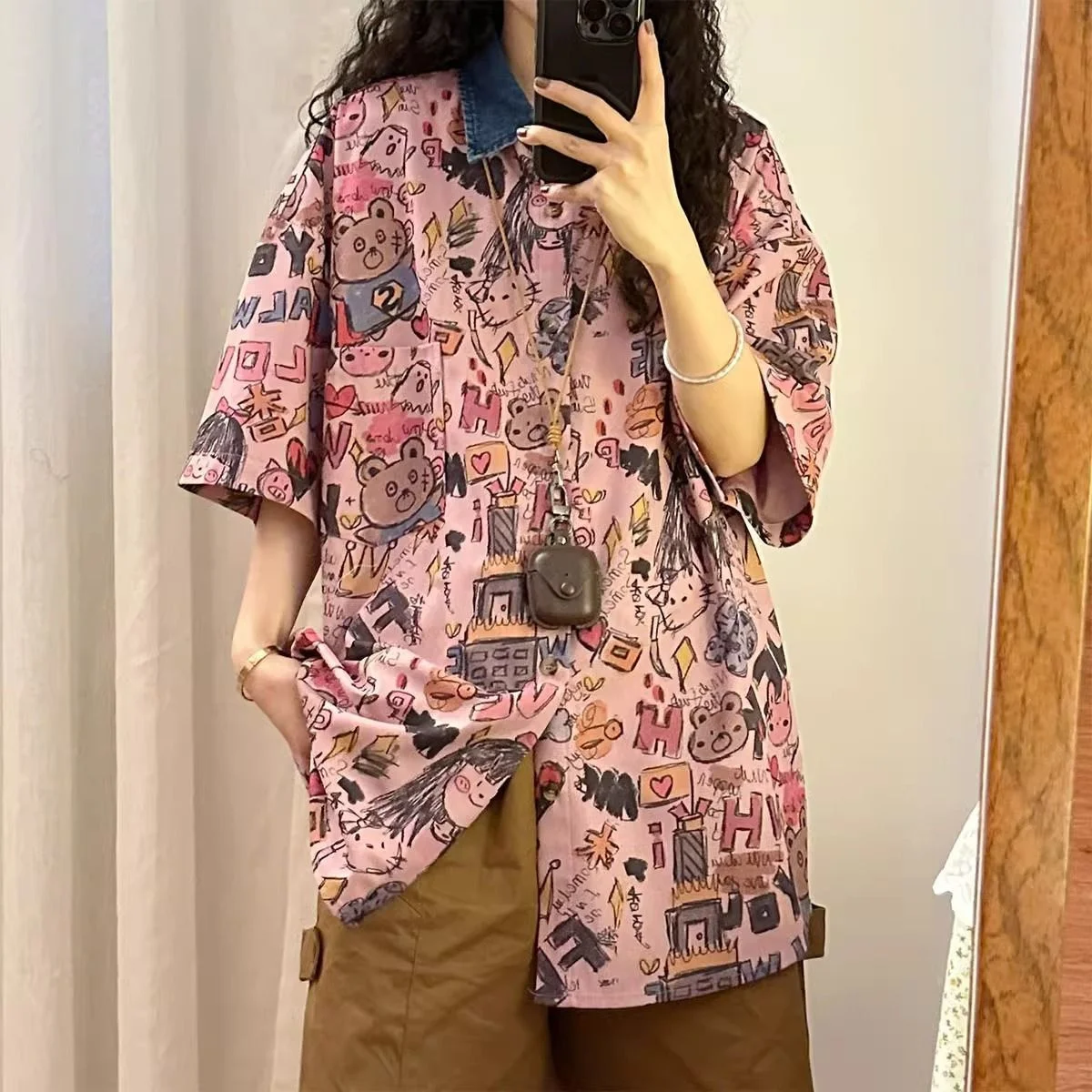 

Fashion Lapel Button Spliced All-match Printed Korean Shirt Female Clothing 2025 Summer New Casual Tops Loose Commute Blouse