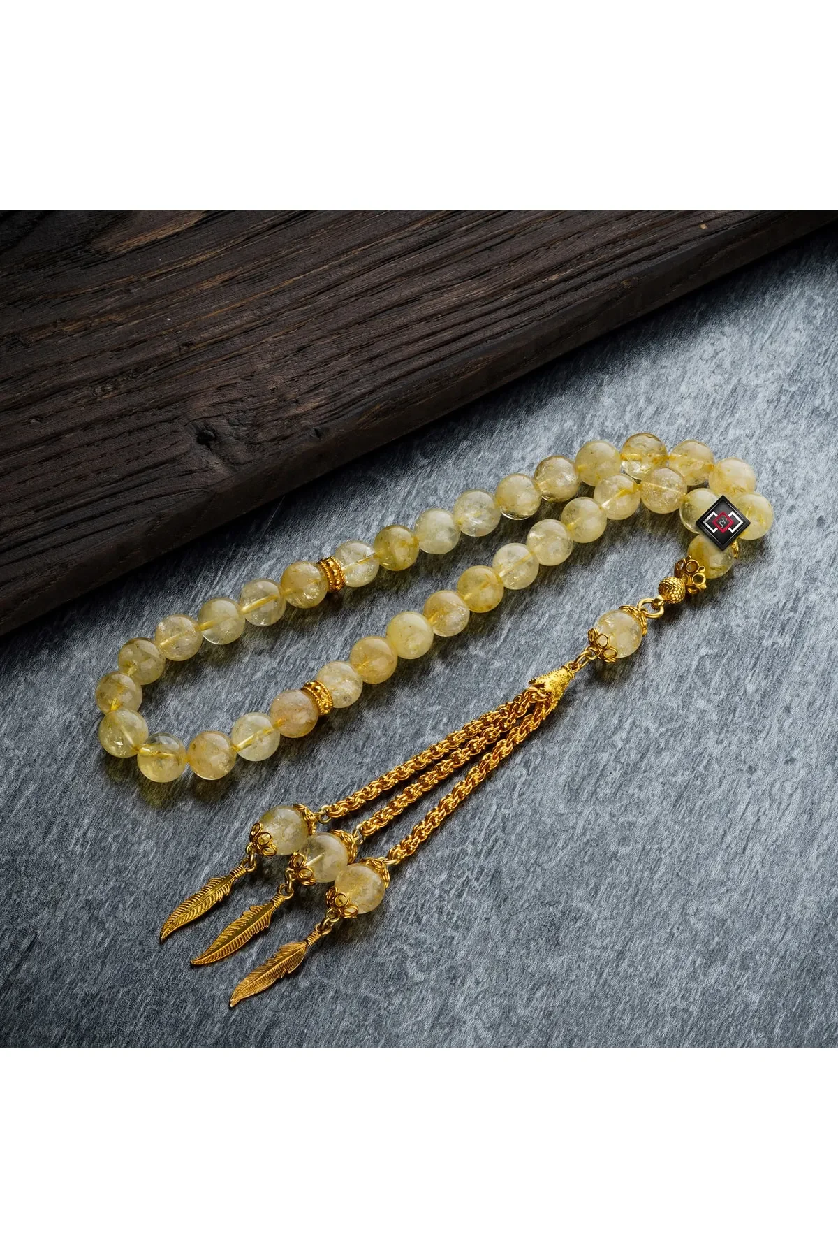 

Rosary with Silver Tassels and Coated with Gold Water