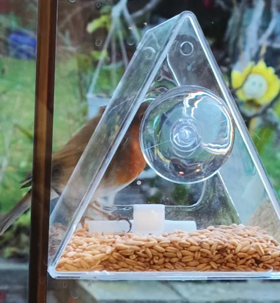 Window Bird Feeder Ultra-Strong Suction Cup, and Weather-Resistant Design for Garden Yard Patio Triangle Acrylic Bird Feeder photo review