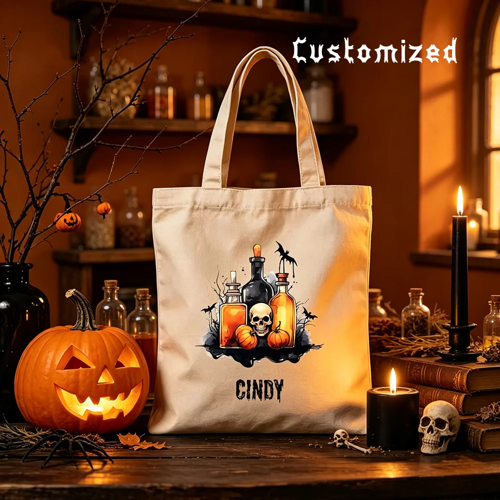 Canvas Tote Designer - กระเป๋าผ้าแคนวาสลายฮาโลวีนแบบสั่งทำชื่อใหม่ปี 2026 ลายขวดพิษแม่มด หัวกะโหลก ฟักทอง และค้างคาว