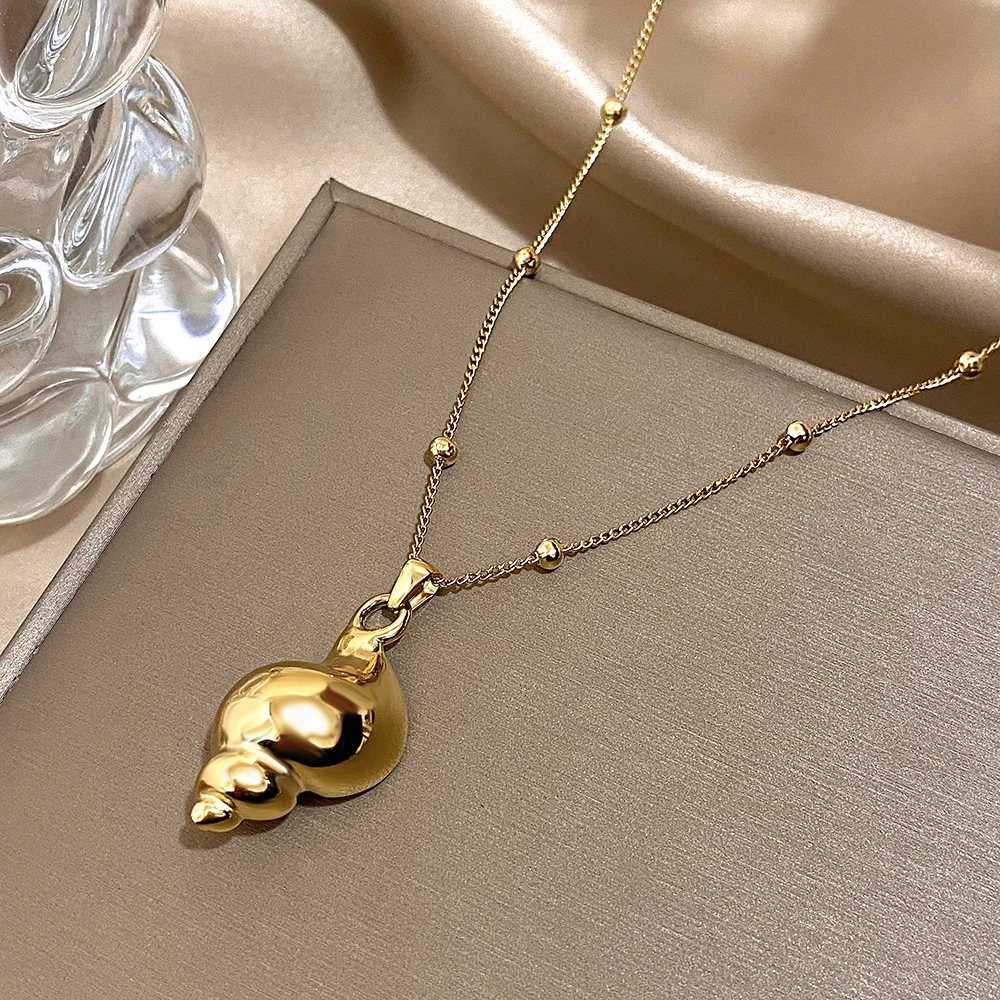 

Freetry Glossy Golden Conch Pendant Necklace for Women Stainless Steel Beads Chain Long Necklace Waterproof Jewelry on the Neck