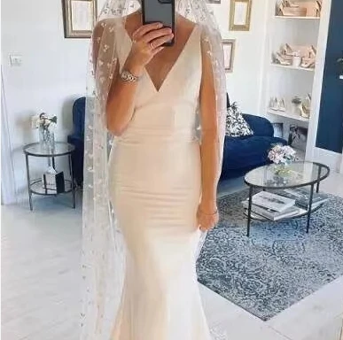 Einfache Meerjungfrau-Hochzeitskleider für Frauen, Knöpfe, Hochzeitskleid mit Schleife, sexy rückenfreies langes Brautkleid