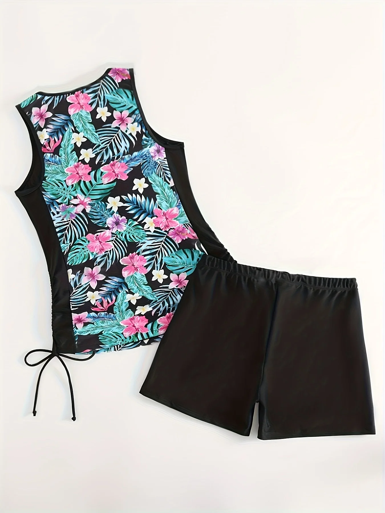 ชุดว่ายน้ำลายทรอปิคอล: เหมาะสำหรับกิจกรรมชายหาดในฤดูร้อนและการพักผ่อนริมทะเล