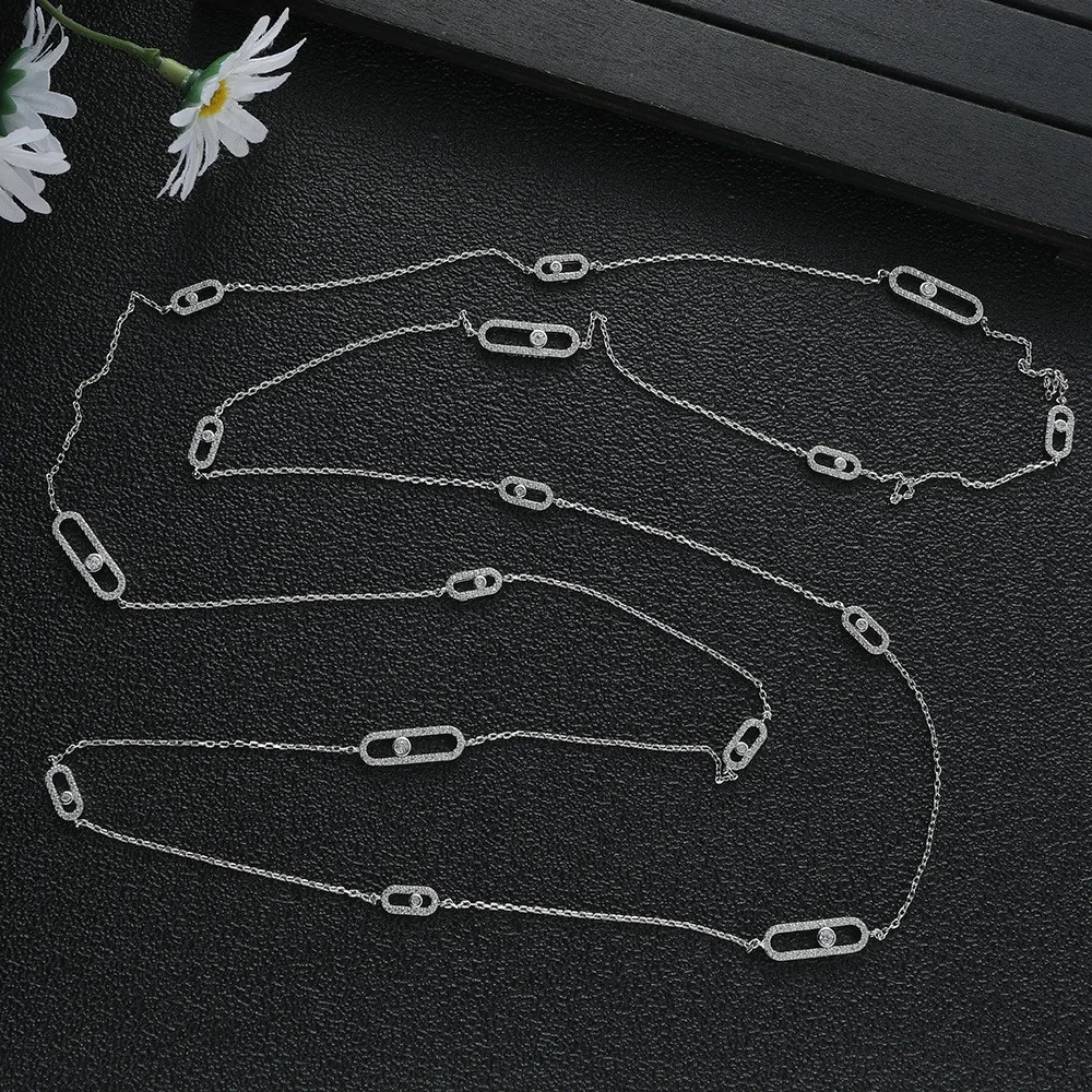 

Роскошное позолоченное ожерелье-цепочка скрепками и акцентами из кубического циркония — регулируемое женское ожерелье с звеньями