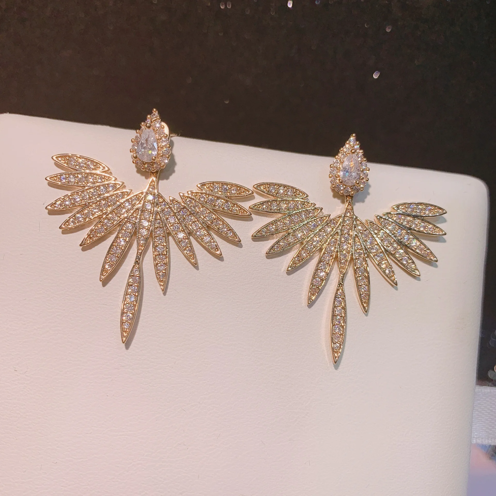 

Luxury Wing Fan Stud Earrings for Women – Statement Crystal Rhinestone Ear Jackets