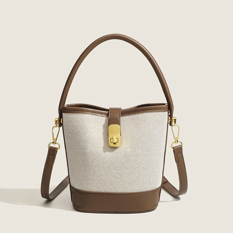 

2025 Trendy and Elegant Bucket bag with a Combination of Mesh and Leather Material and Gold Tone Hardware Decoration