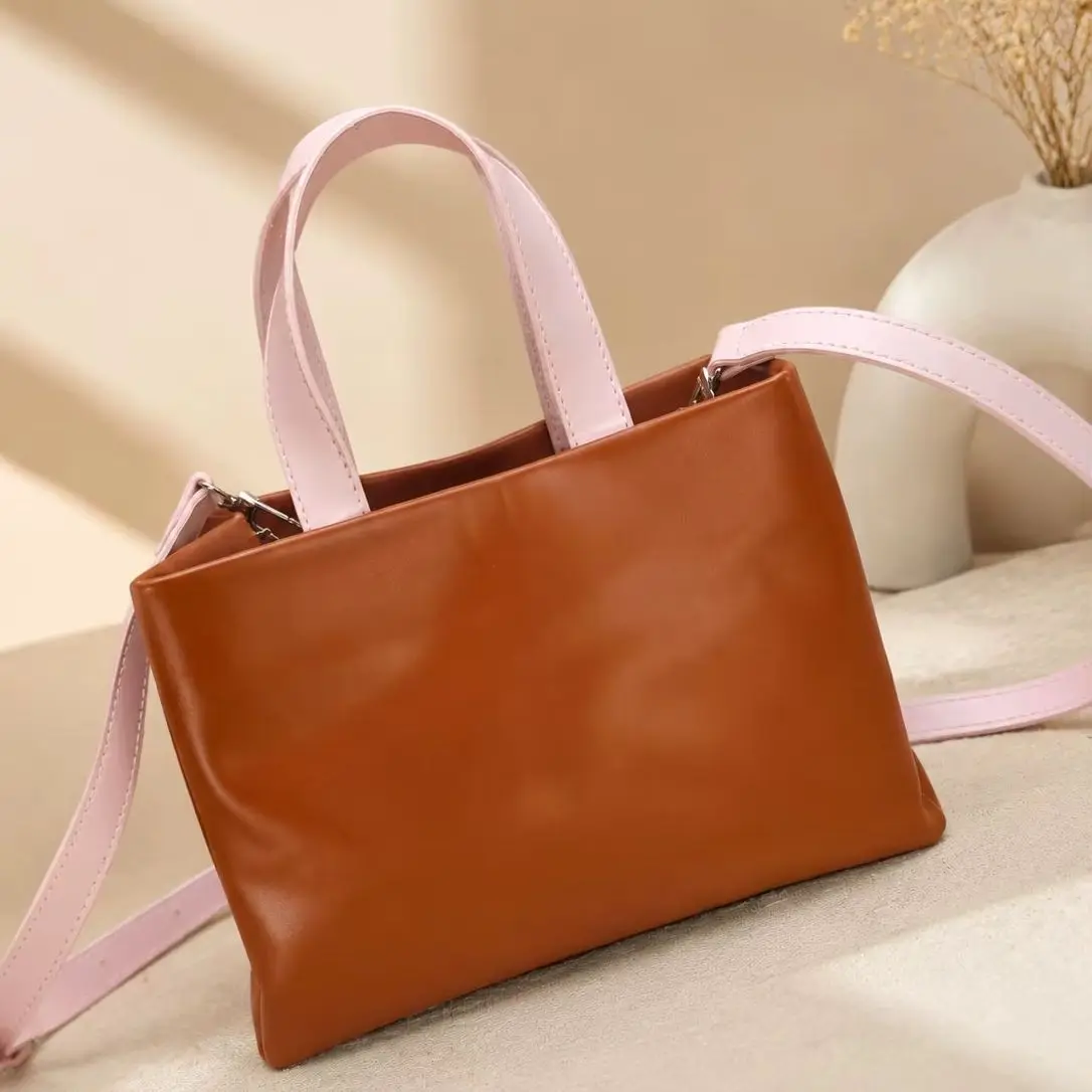 2026 New Luxury Bag Cow Leather Fabric Lining Shopper Medium Handbag down details 25x19x11cm