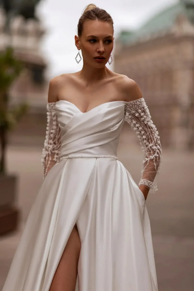 Annie Glitter Lentejuelas Mangas largas Vestidos de fiesta Plisado Preciosos vestidos de noche de trapeador de satén blanco Vestido de fiesta con abertura lateral Orvernali Günudenmavera