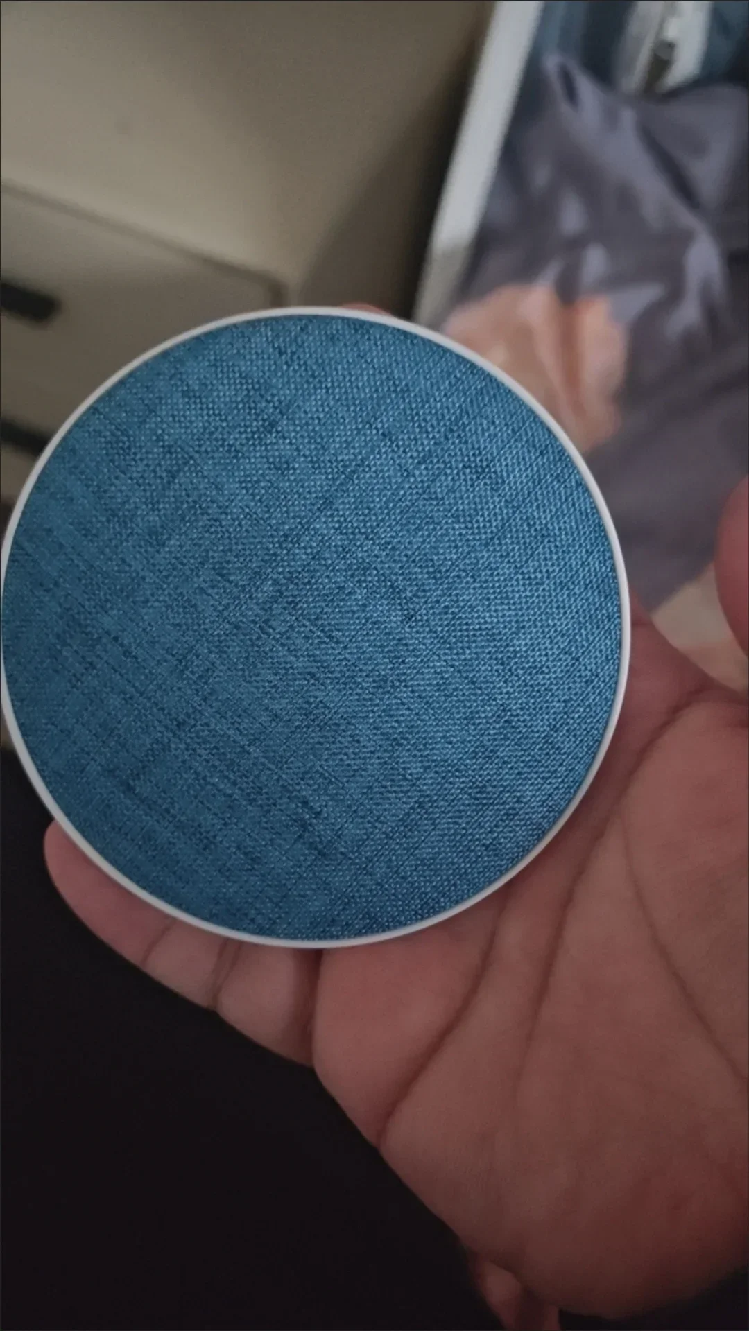 Customer photo of the PillowTone under a pillow