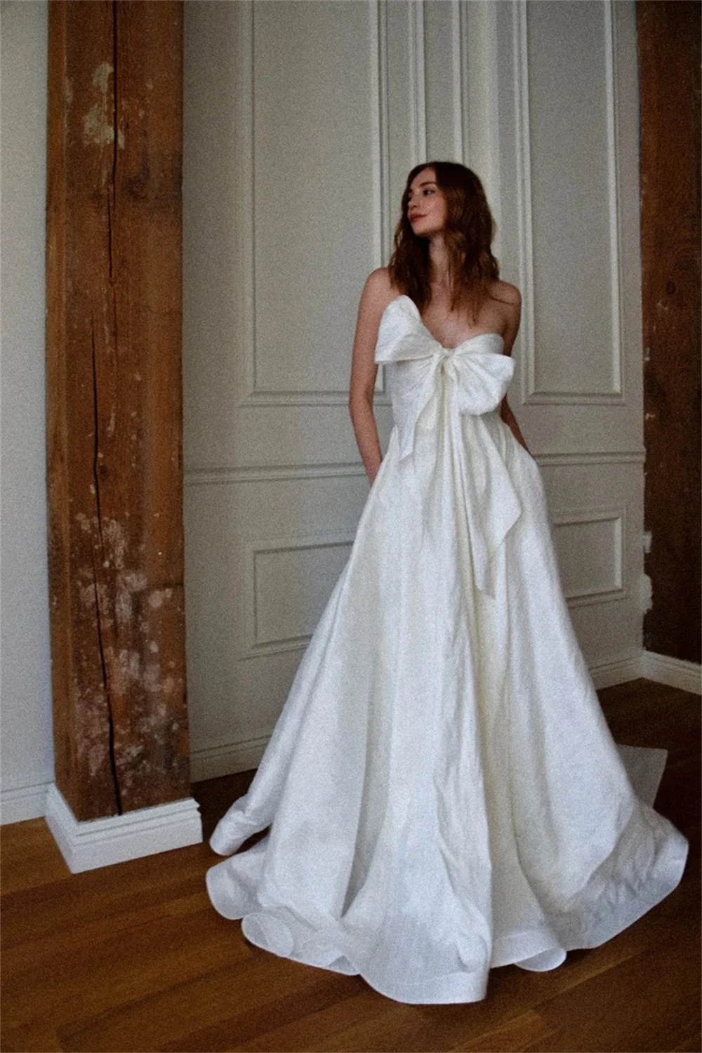 Sansa Aangepaste Witte Sweetheart Hals A-lijn Elegante Strik Galajurk Mouwloos Vestidos De Noche Vloerlengte Formele Avond