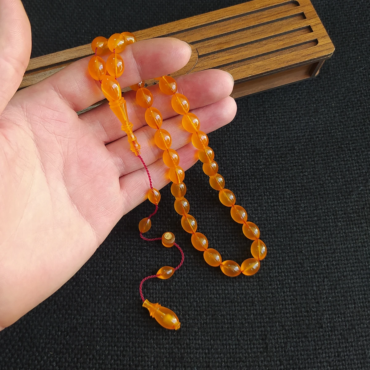 

Mesut Elma Islamic Prayer 33 Beads Tightening Amber Rosary 8x11 mm Orange Dice Amber Tasbih مسبحة Bakelite كهرمان Tesbih