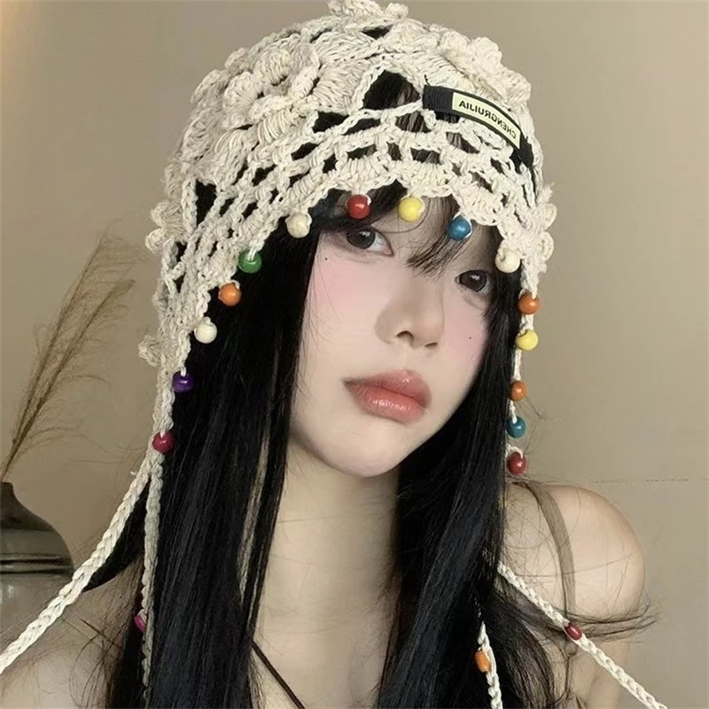 Bohemian tassel hand-knitted toe hat women\'s ethnic style vacation INS special beanies sweet cut-out versatile pullover hat