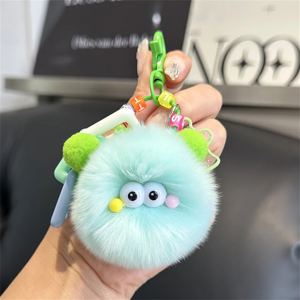 LLavero de dibujos animados para coche, muñeco de peluche con bola de carbón pequeña, colgante para mochila, regalo de joyería