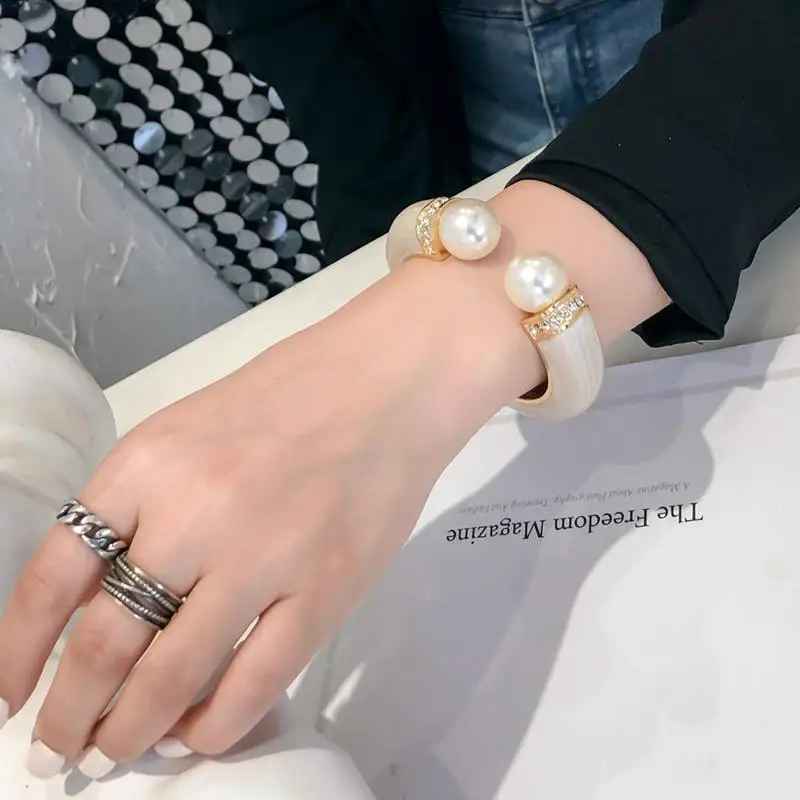 

Pearl Cuff Bracelet – Statement Bangle with Crystal Accents & Gold-Tone Elegance