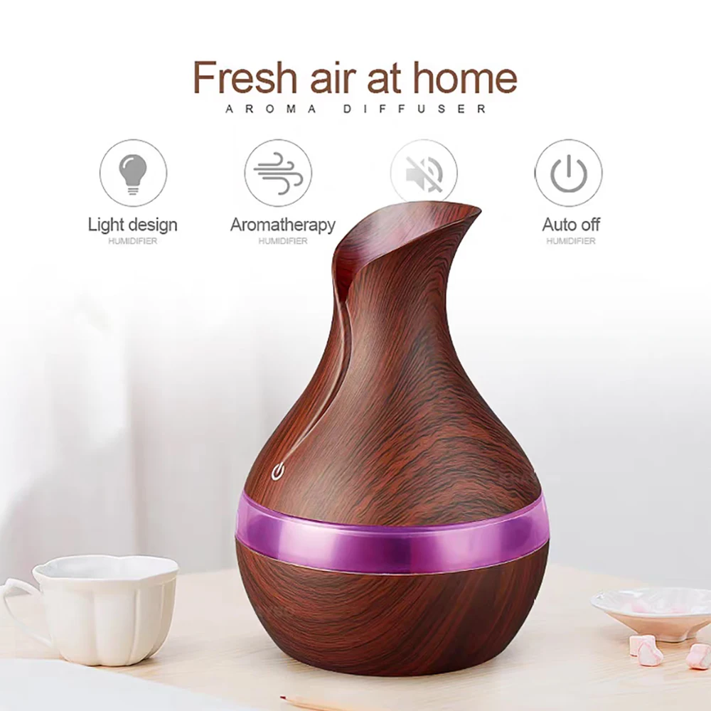 

Air Humidifier Essential Oils Diffuser With 7 LED Lights Night Light Wood Grain Includes 2 bottles