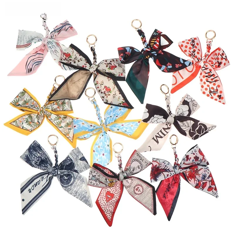 tipoCC88 pratiqueCC88품Camellia Jedwabny szalik Bowknot Brelok do kluczy Świeża damska torba Decor .Wstążka Kokarda Romantyczna torba Urok Modne akcesoria — zdjęcie 2