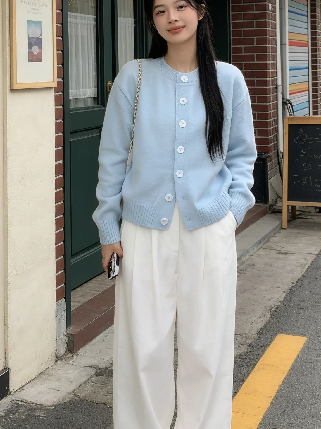 

Elegant light blue autumn women's long-sleeve casual knitted cardigan soft acrylic sweater with button decoration