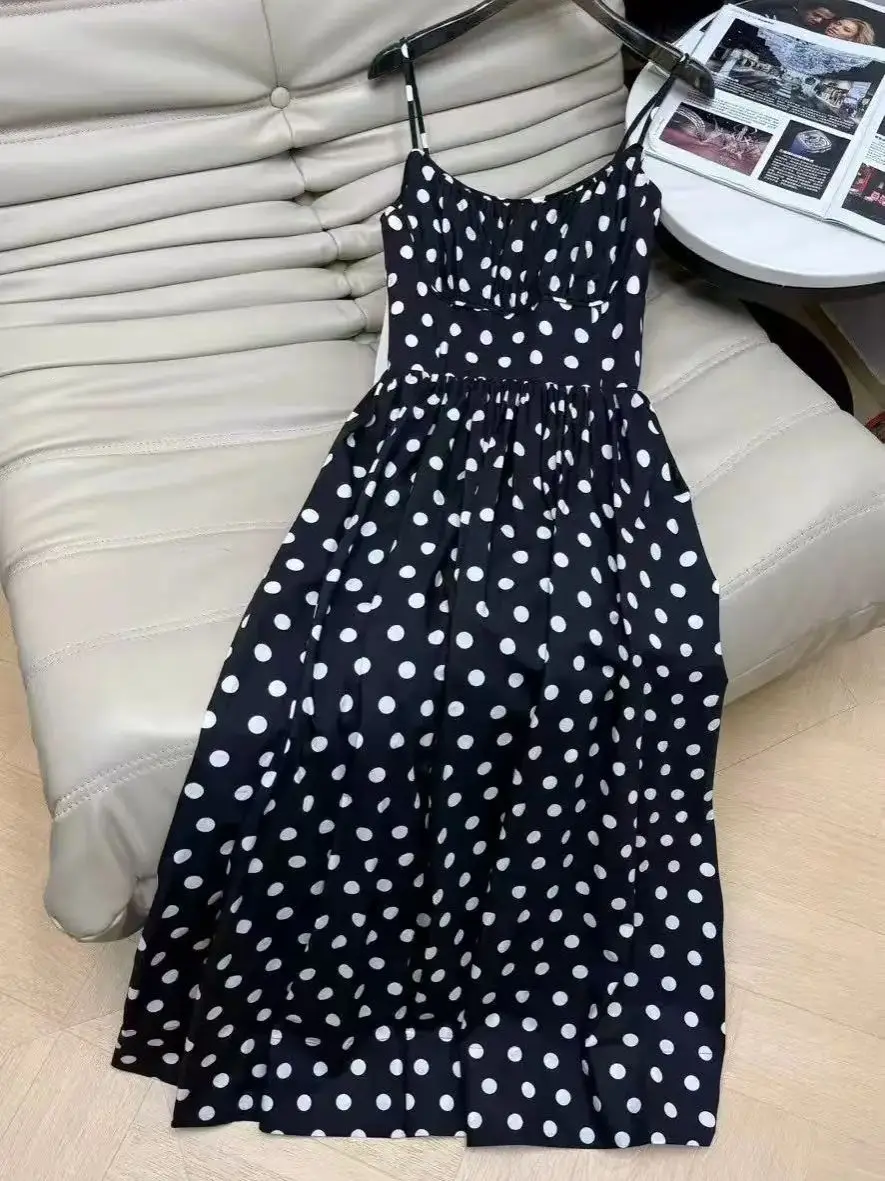 

Comfortable and breathable sundress with thin straps and a polka dot print