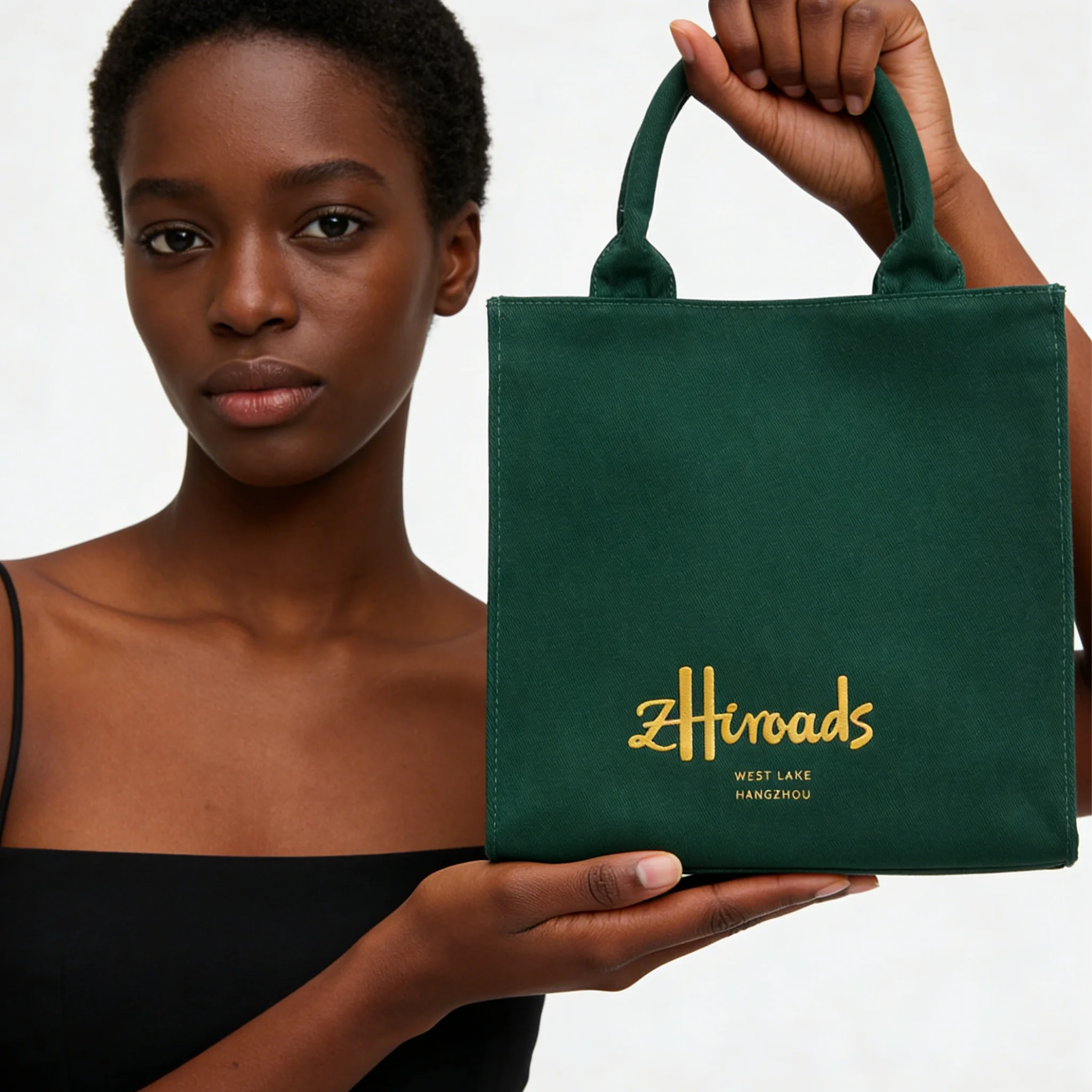 

Элегантная дизайнерская сумка-тоут премиум-класса из холщовой ткани темно-зеленого цвета с золотым принтом