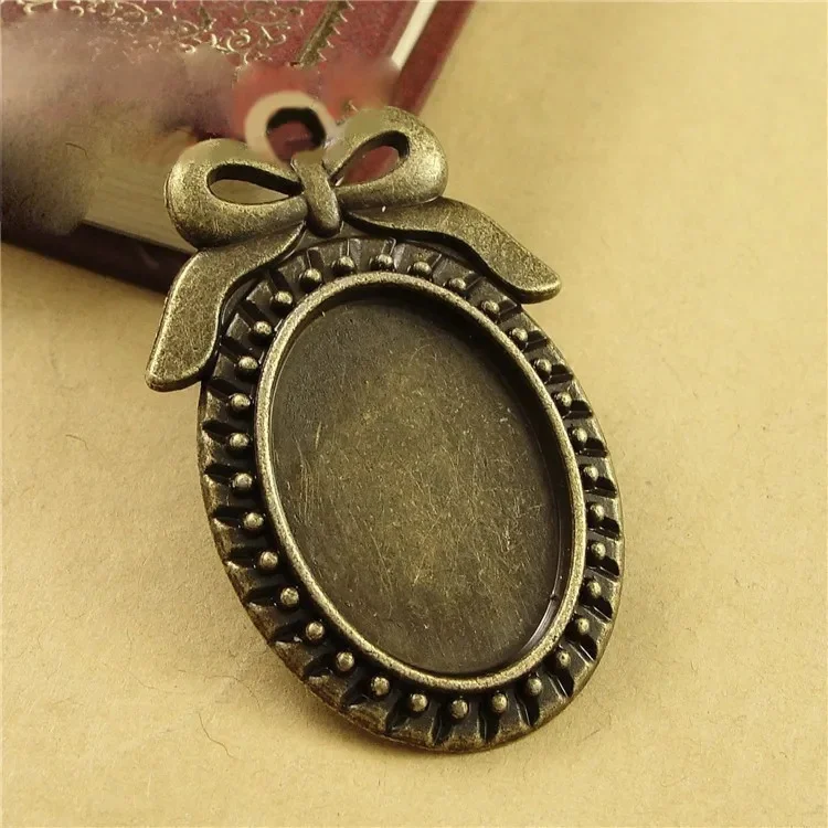 REGELIN 10 sztuk/partia dwa kolory filigranowa kokardka cameo cabochon ustawienie podstawy taca na wisiorki 18*25mm wykroje dla DIY tworzenia biżuterii — zdjęcie 2