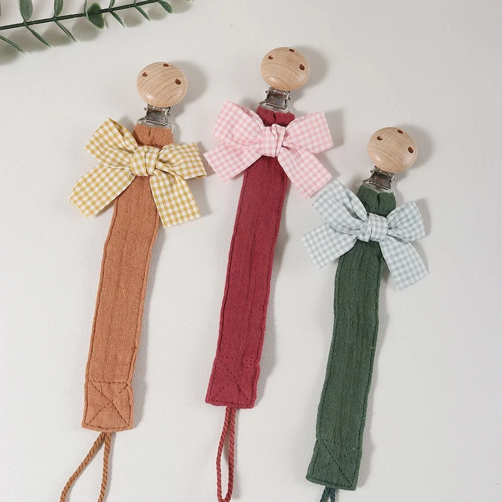 Attache-sucette à nœud en coton pour filles, porte-sucette pour bébé avec clip en bois, sangle en coton mousseline douce pour chaîne factice pour nouveau-né