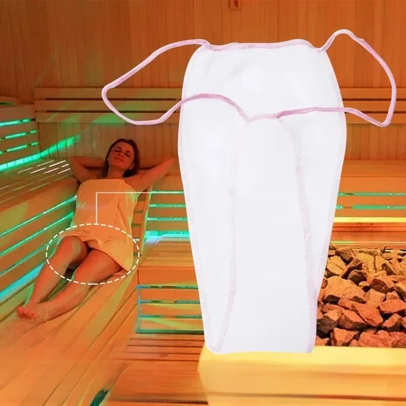 100 pièces pour femmes Spa tissus Non tissés sous-vêtements bronzage enveloppes Salon culotte jetable T string hygiénique emballé individuellement