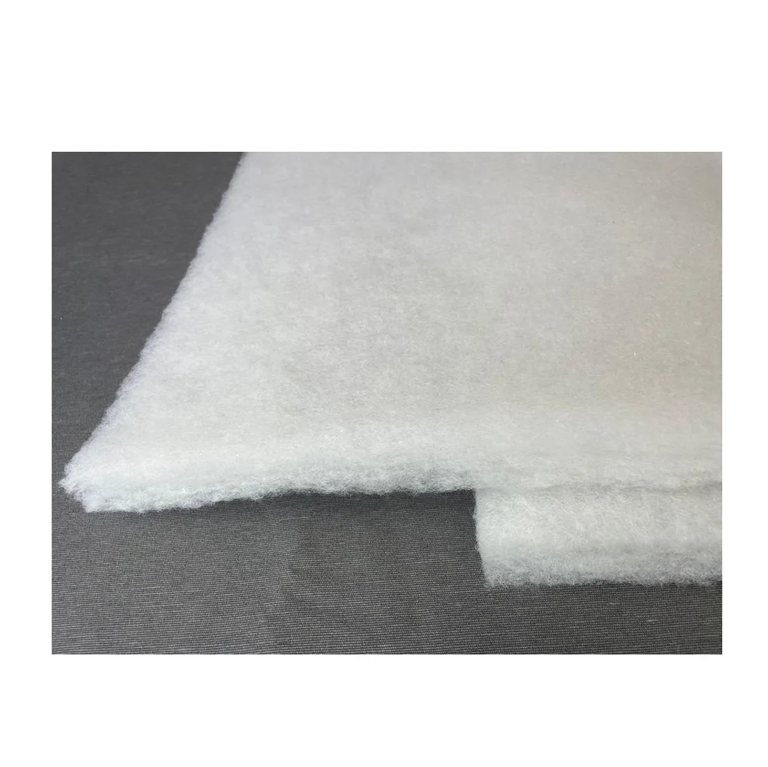 Fitted textile-wadding for crafts by meters. Microfiber Napa 150 gr/m2 for padding and padding 160 cm wide. Piece by meters of high quality, durable, soft, lightweight, breathable and anti-mites.