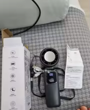 Portable fan in use 1