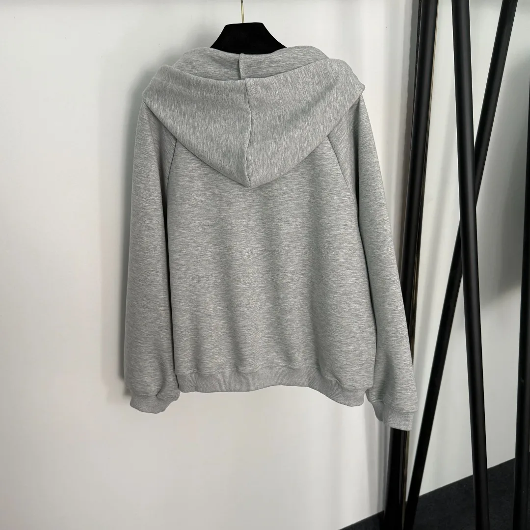 

2025 new sportswear set features a long-sleeved hooded zipper jacket with embroidery on the chest and casual skinny pants