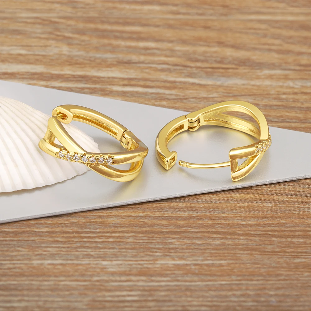 Nidin ต่างหูรูปหยดน้ำประดับด้วยเพทายสีขาวแบบไขว้ที่ได้รับความนิยมเครื่องประดับหูแฟชั่นหญิงของขวัญสุดสร้างสรรค์