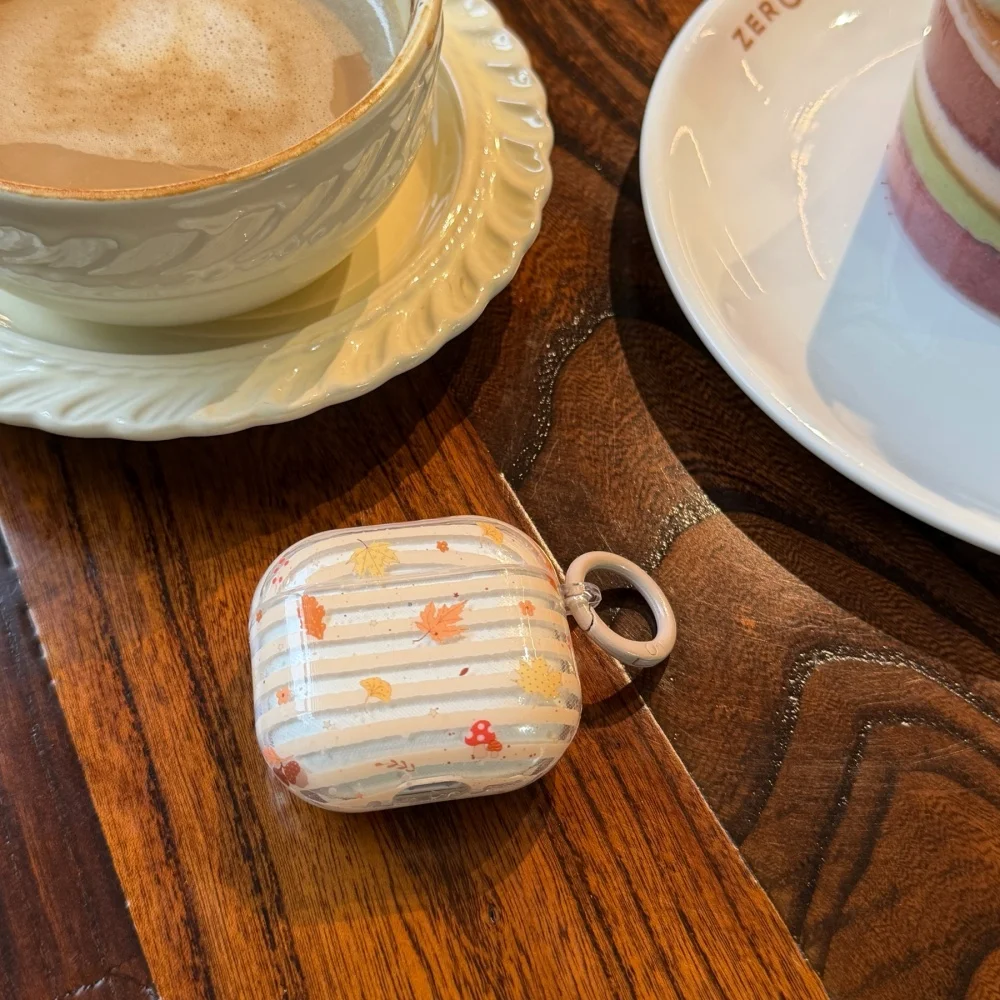

Beige striped maple leaf headphone protective case, suitable for AirPods4/3/2Pro/2/4, fashionable new shockproof protective case