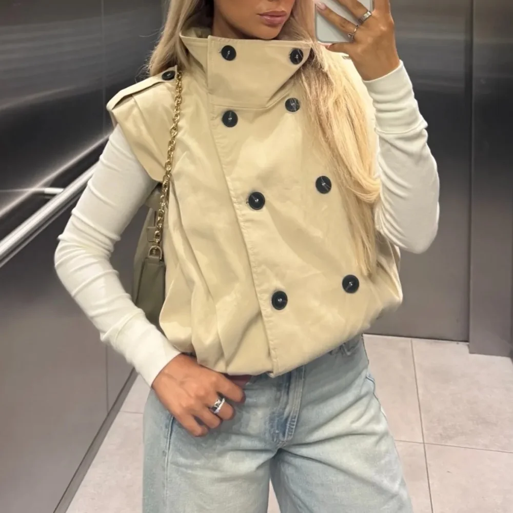 Chaleco Trench Beige de Cuello Alto para Mujer, Sin Mangas, Doble Botonadura, con Dobladillo Elástico y Epaulettes en los Hombros, Estilo Corto 2026