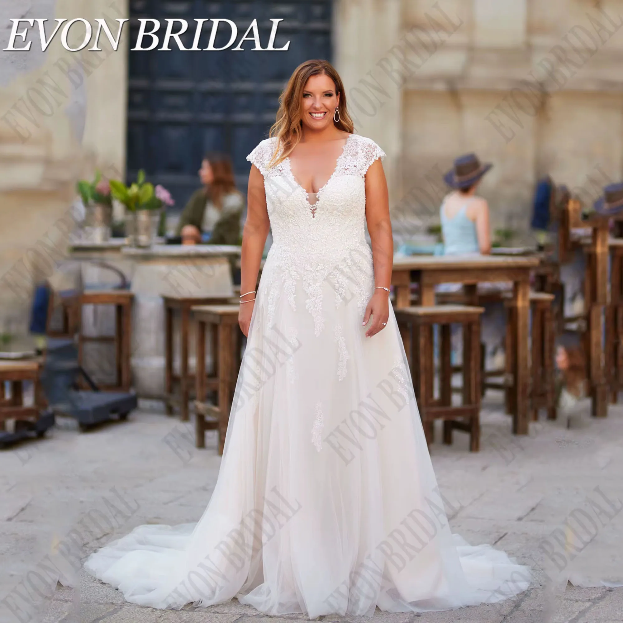 فستان زفاف كبير الحجم العروس على شكل حرف v وأكمام قصيرة مزين فساتين العروس Vestidos De Novia بأربطة ترتر EVON BRIDAL مخصص #1