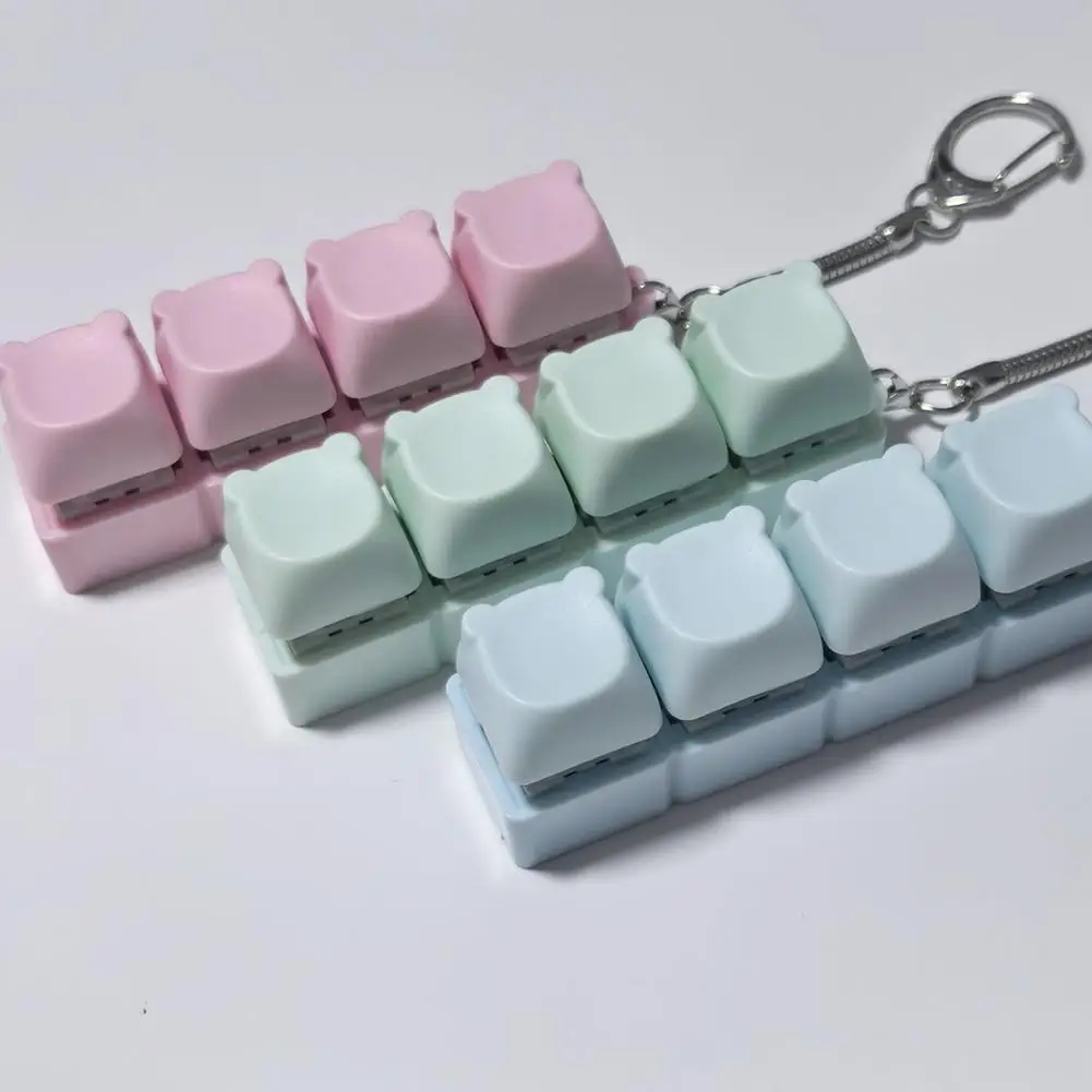 ของเล่นคลายเครียด 4 ปุ่ม คีย์แคปแบบกดนิ้ว ของเล่นบีบคลายเครียด พวงกุญแจ ของขวัญสำหรับเด็กและผู้ใหญ่