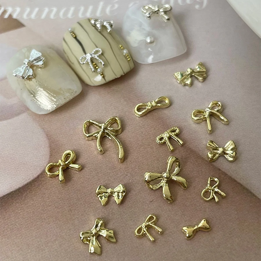 10 sztuk/worek luksusowa kokardka Nail Art Charms 3D stop muszka biżuteria do paznokci dekoracja ze strasem DIY akcesoria