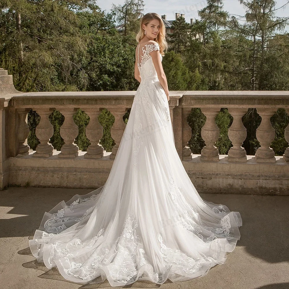 Flamboyance-vestidos de novia acampanados, ropa de novia transparente con cuello redondo, mangas casquillo, Apliques de encaje, tren de barrido,