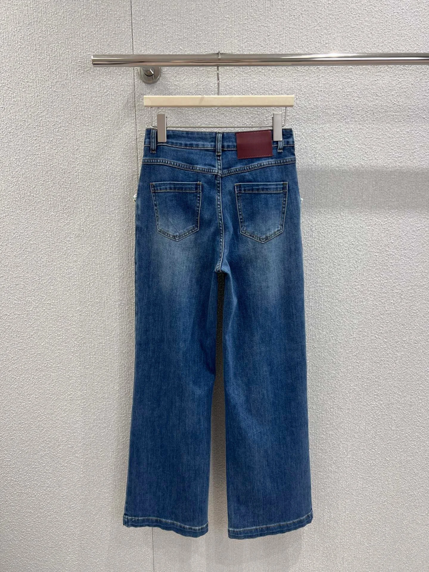 Spodnie jeansowe New Jeans 2025, jednolite, z kieszeniami, bawełniane, uniwersalne, wyszczuplające, podkreślające figurę, na zimę i jesień.