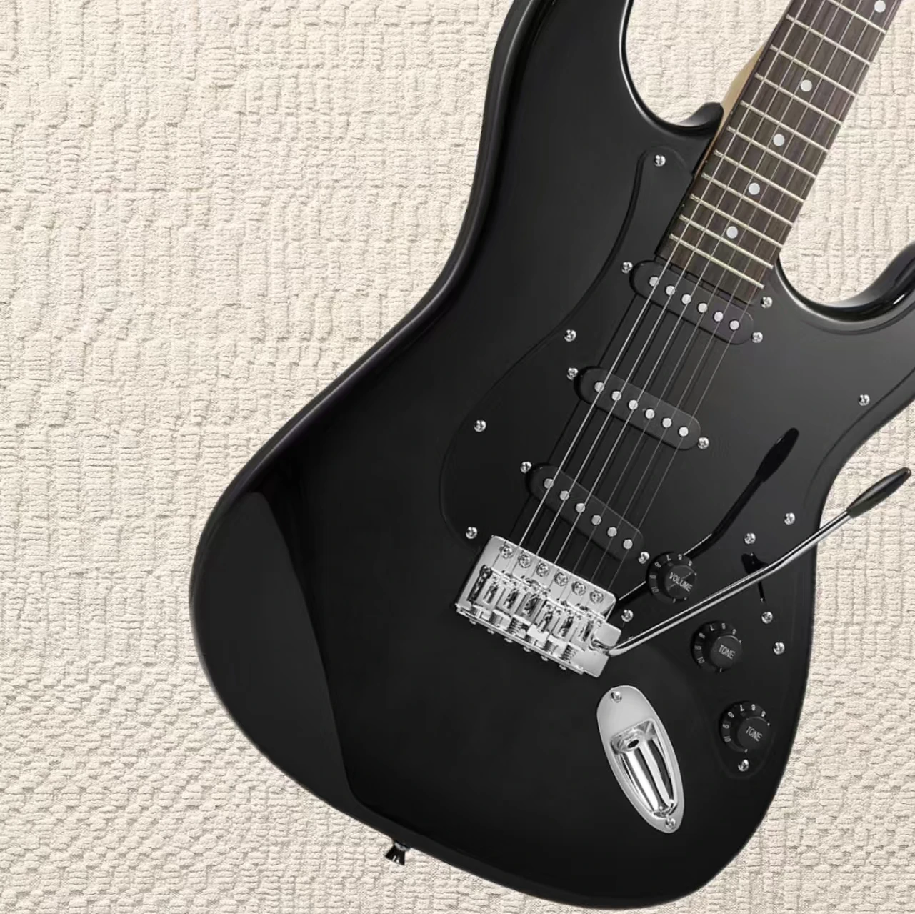 

Black electric guitar with 6 strings, featuring classic black lacquer and SSS pickups