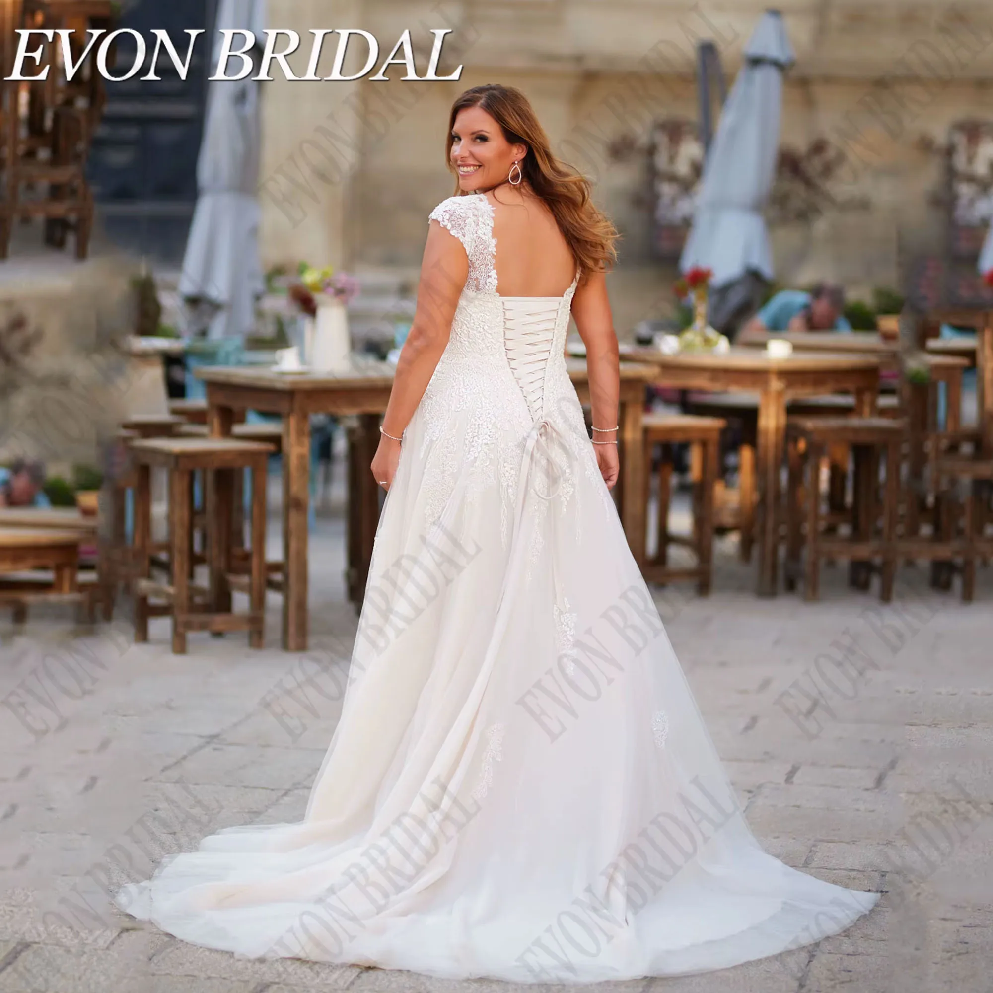 فستان زفاف كبير الحجم العروس على شكل حرف v وأكمام قصيرة مزين فساتين العروس Vestidos De Novia بأربطة ترتر EVON BRIDAL مخصص #2