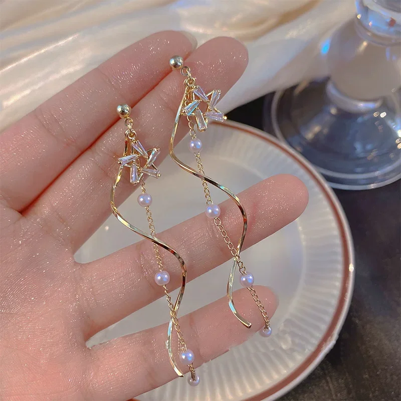 Temperament Crystal Star Tassel Drop Earrings For Women New Long Ear Line Bowknot Leaves Earrings Girls Wedding Party Jewelry — zdjęcie 2