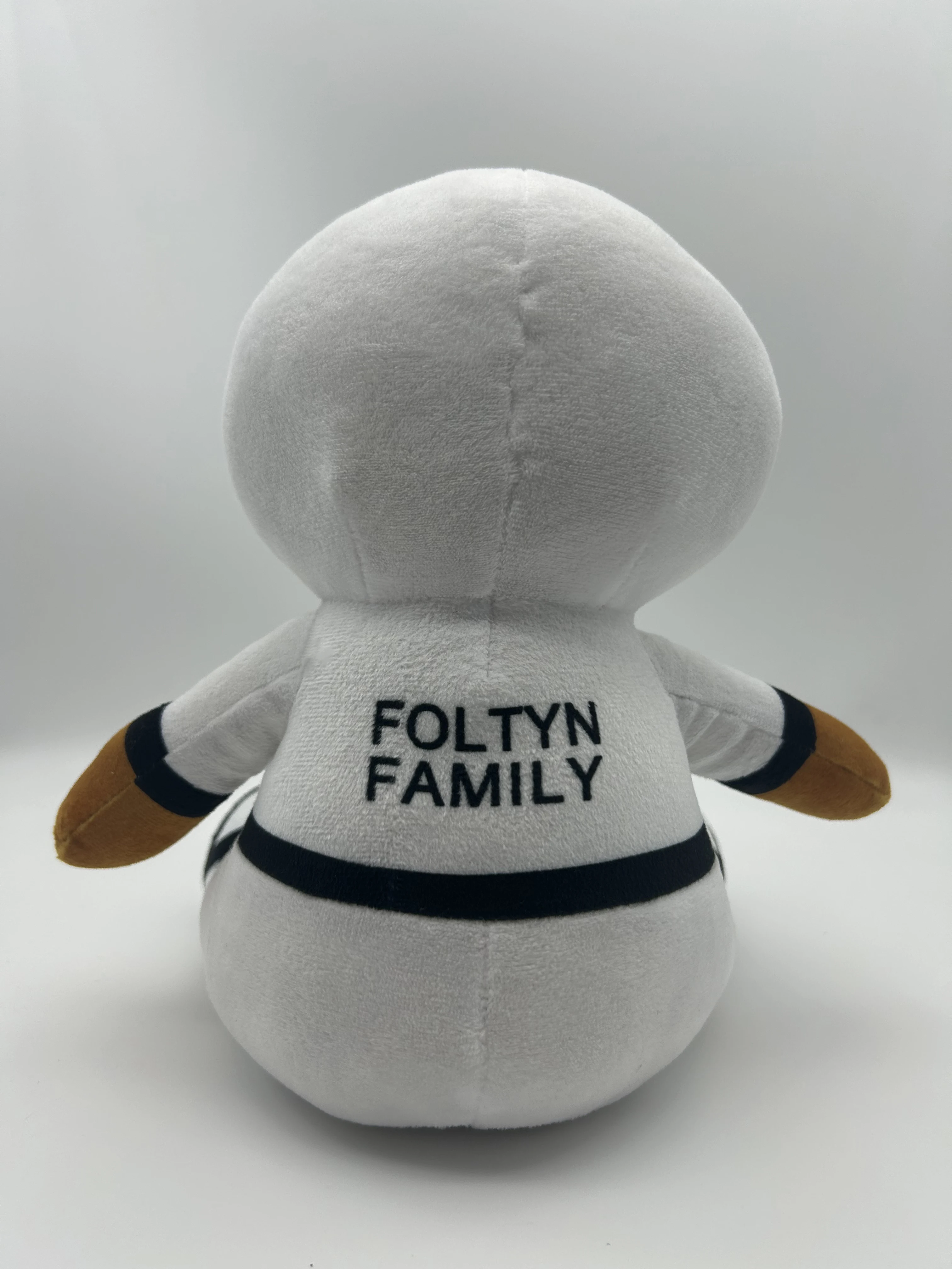 The 8.7 Foltyn Family Standard Plush Toy is a soft stuffed pillow designed for kids' room decor, making it an ideal gift for kid